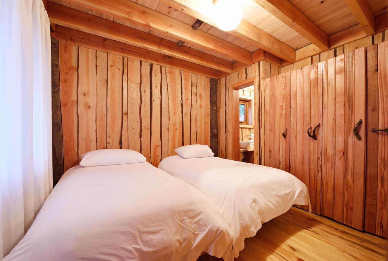 Huilo Huilo Cabanas Del Bosque Puerto Fuy Bilik gambar